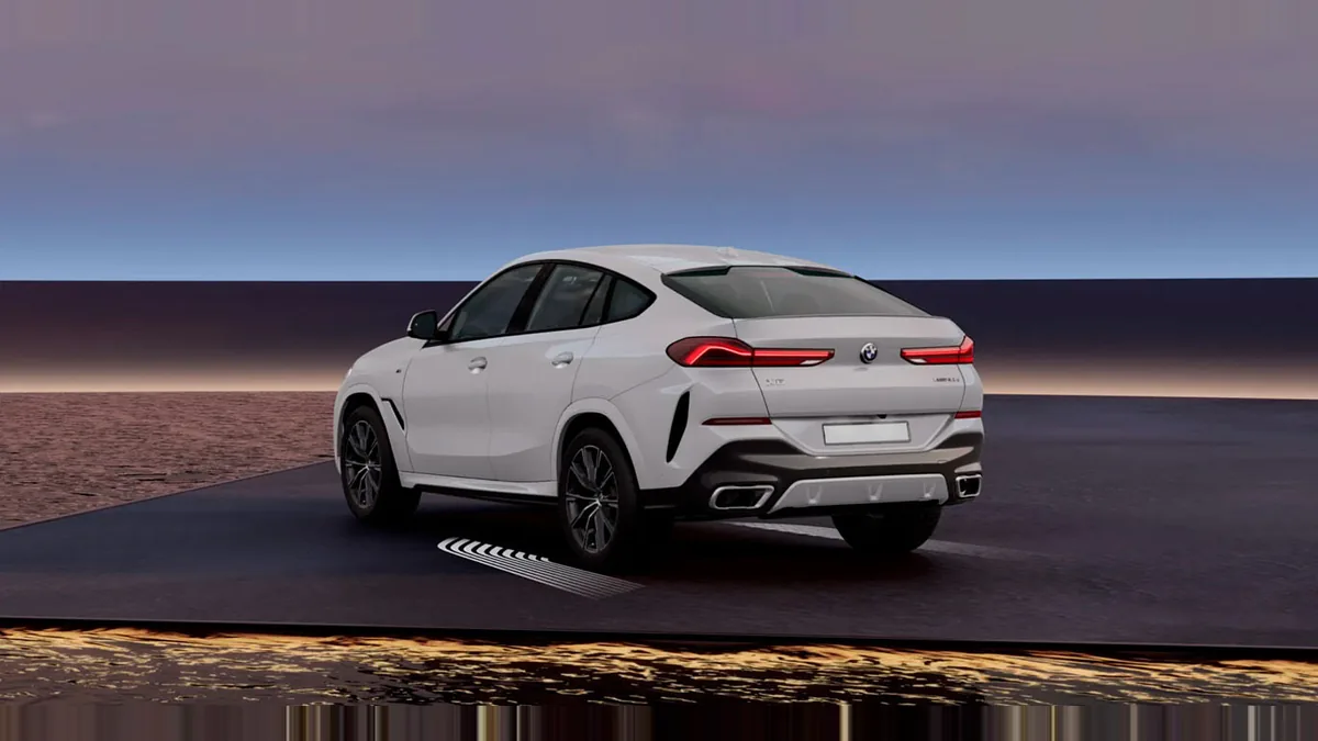 BMW X6 xDrive30d M Sport en renting a Barcelona — Lateral